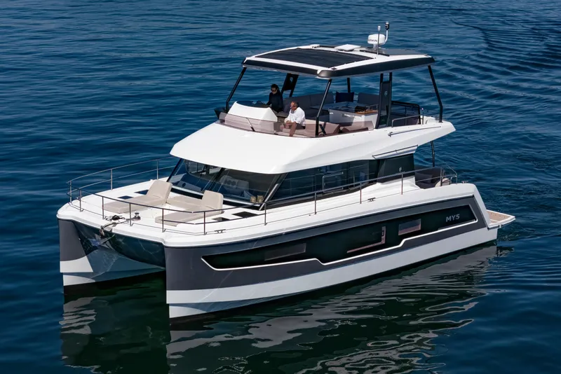 The Image of 2024 Fountaine Pajot MY5 yacht cruising on calm blue waters. - 0