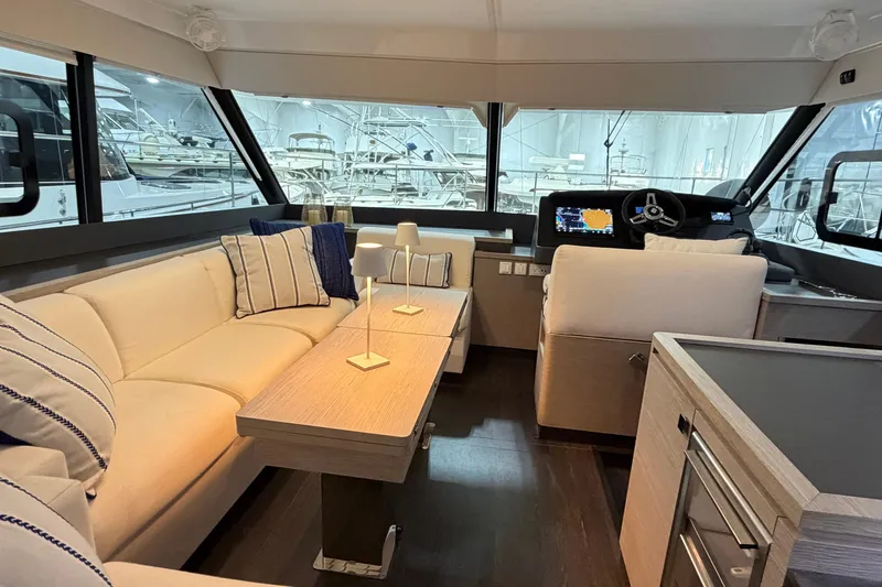 Slide: The Image of Luxurious interior of 2024 Fountaine Pajot MY5 yacht with elegant seating and modern helm. - 16