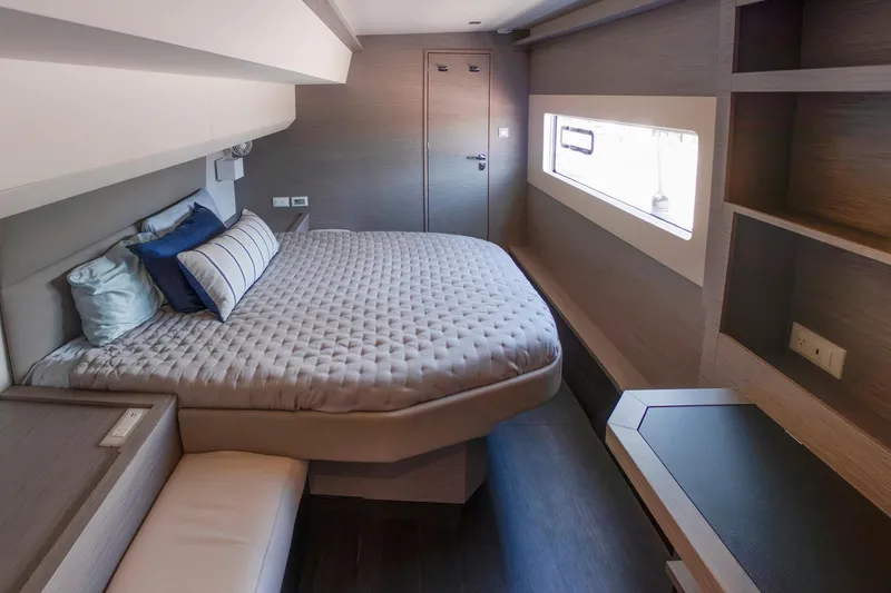 Slide: The Image of Luxurious cabin interior of 2024 Fountaine Pajot MY5 yacht, featuring modern design and comfortable bedding. - 31