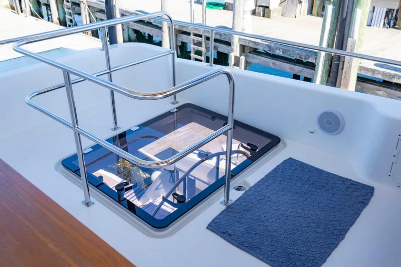 Slide: The Image of 2024 Fountaine Pajot MY5 yacht deck with glass hatch and railing. - 50