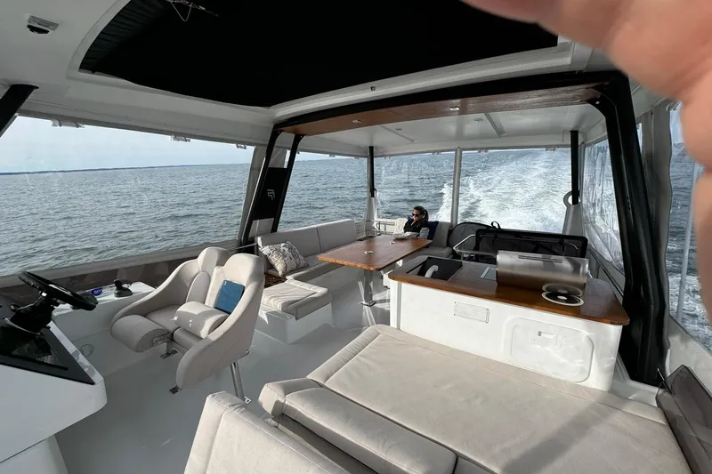 Slide: The Image of Luxurious interior of 2024 Fountaine Pajot MY5 yacht cruising on open water. - 18