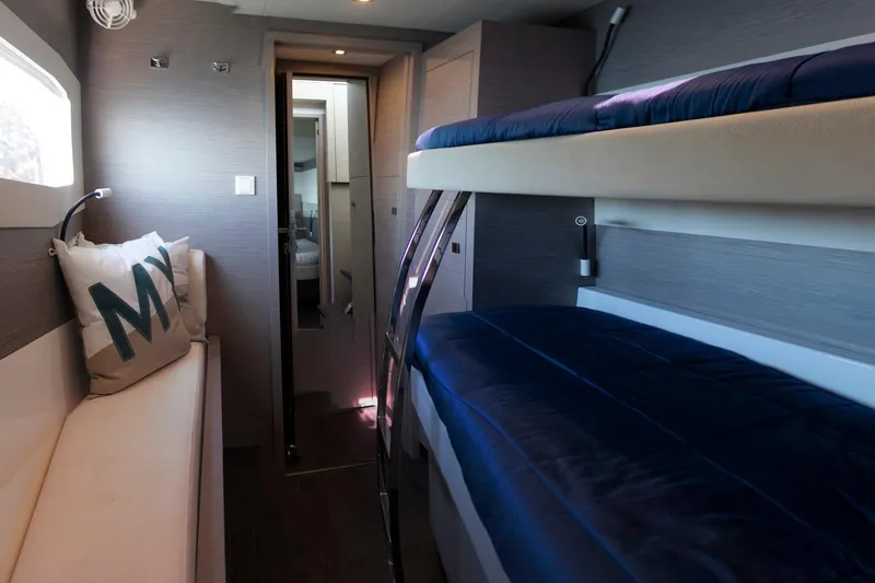 Slide: The Image of Interior of 2024 Fountaine Pajot MY5 yacht with bunk beds and modern design. - 28