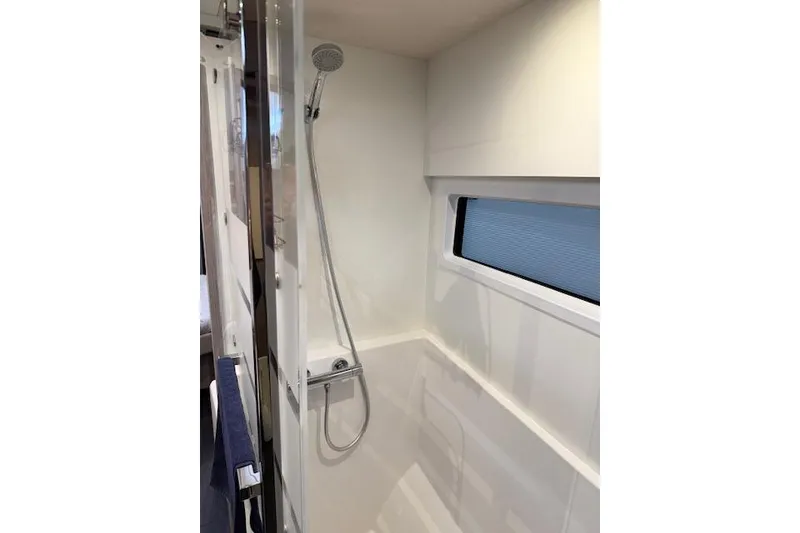 Slide: The Image of 2024 Fountaine Pajot MY5 boat propeller and rudder detail on dry dock. - 39