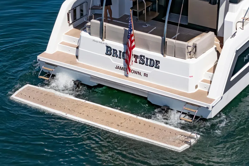Slide: The Image of 2024 Fountaine Pajot MY5 yacht with swim platform, docked in Jamestown, RI. - 6