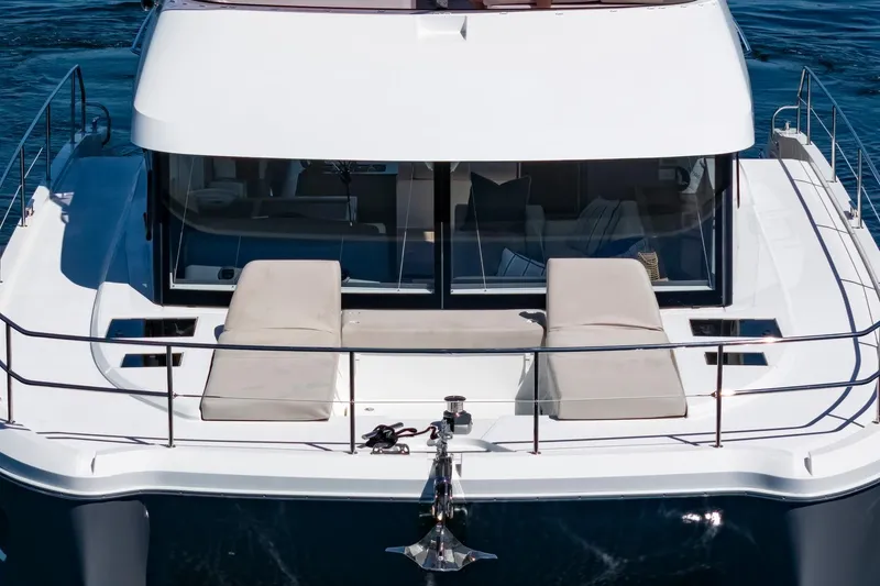 Slide: The Image of 2024 Fountaine Pajot MY5 yacht with spacious deck and modern design on the water. - 65
