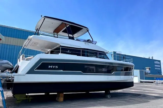 The Image of 2024 Fountaine Pajot MY5 yacht on display at a marina, showcasing sleek design. - 0