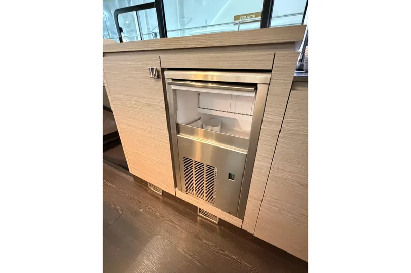 Slide: The Image of Built-in stainless steel refrigerator on 2024 Fountaine Pajot MY5 yacht interior. - 22