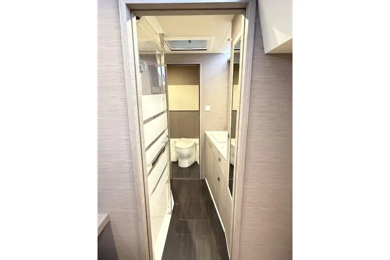 Slide: The Image of 2024 Fountaine Pajot MY5 yacht bathroom with modern fixtures and sleek design. - 28