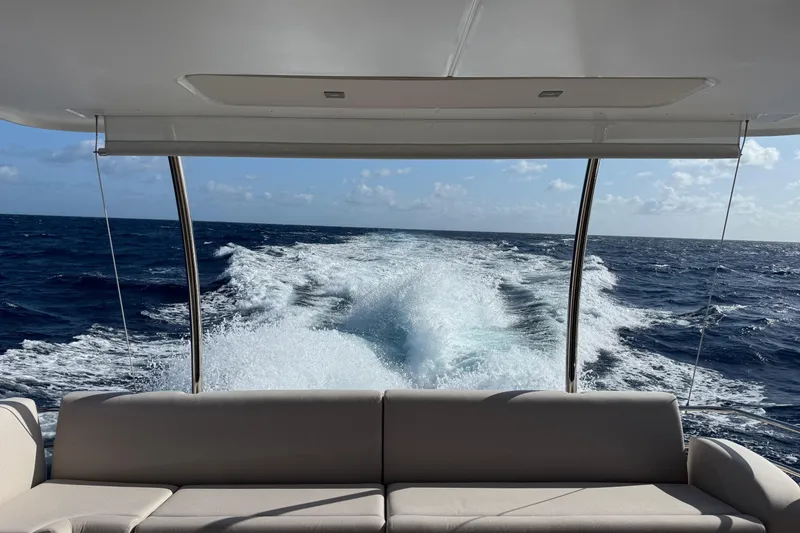 Slide: The Image of 2024 Fountaine Pajot MY5 yacht cruising on open sea, view from deck. - 34