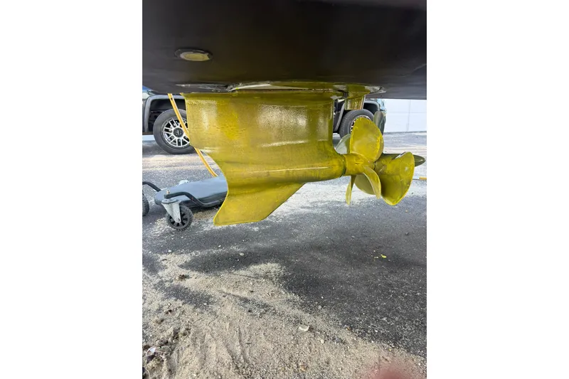 Slide: The Image of 2024 Fountaine Pajot MY5 boat propeller and rudder detail on dry dock. - 35