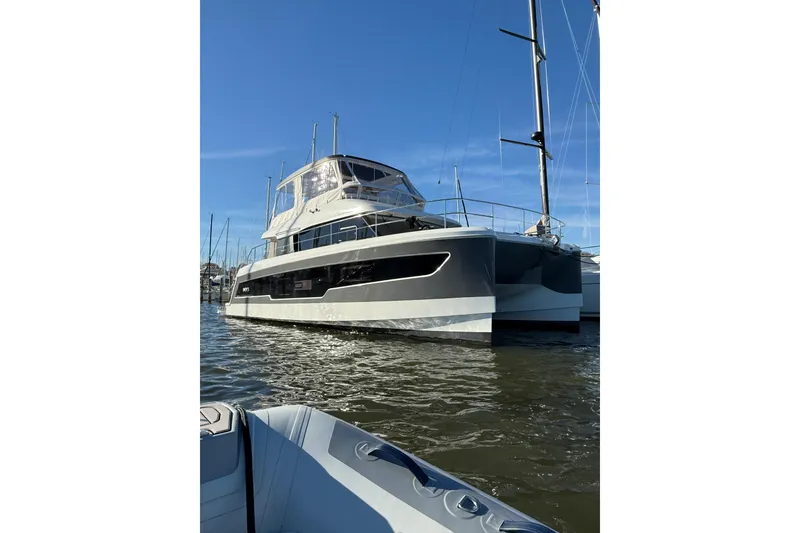 Slide: The Image of 2024 Fountaine Pajot MY5 yacht on water, showcasing sleek design and modern features. - 8