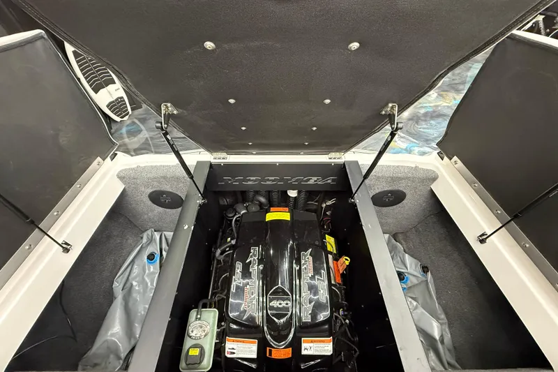 Slide: The Image of 2019 Moomba Mojo engine compartment showcasing Raptor 400 motor. - 12