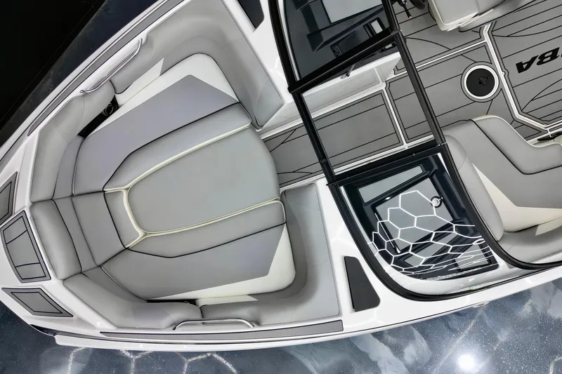 Slide: The Image of 2019 Moomba Mojo boat interior with sleek gray seating and modern design elements. - 5