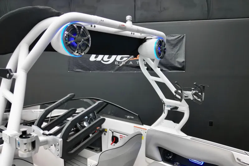 Slide: The Image of 2019 Moomba Mojo boat interior with advanced audio system and sleek design. - 7