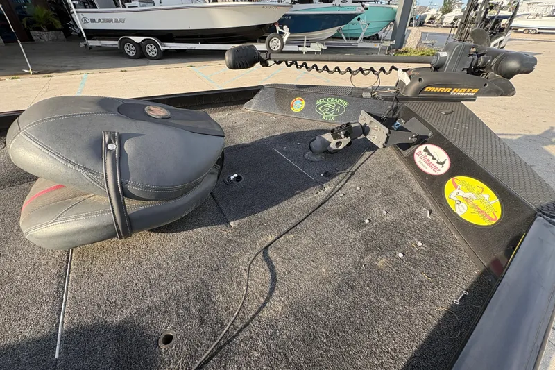 Slide: The Image of 2016 Ranger RT188 boat deck with fishing seat and trolling motor. - 12