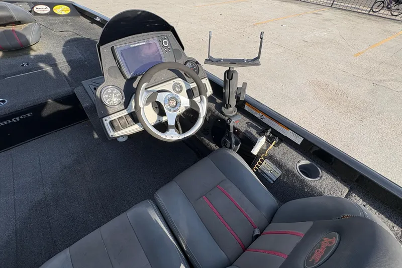 Slide: The Image of 2016 Ranger RT188 boat cockpit with steering wheel and control panel. - 20