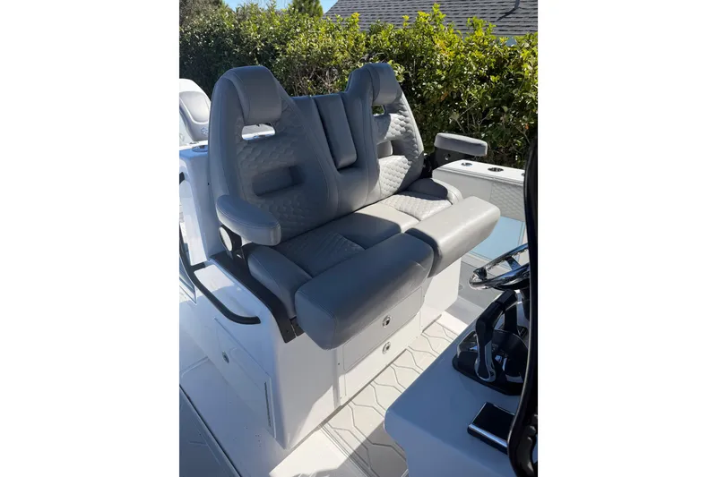Slide: The Image of Gray seating on 2016 SeaHunter 35 Tournament boat, featuring modern design and comfort. - 9