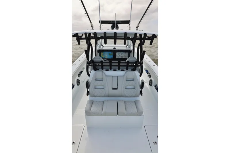 Slide: The Image of 2024 Freeman 38 boat interior with modern seating and navigation equipment. - 18