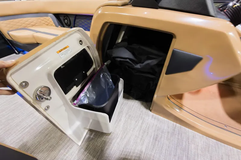 Slide: The Image of Storage compartment in 2026 Godfrey Monaco 255 Single Flip Lounge boat interior. - 17