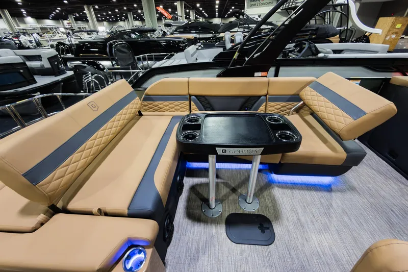 Slide: The Image of Luxurious interior of 2026 Godfrey Monaco 255 Single Flip Lounge pontoon boat with elegant seating. - 21