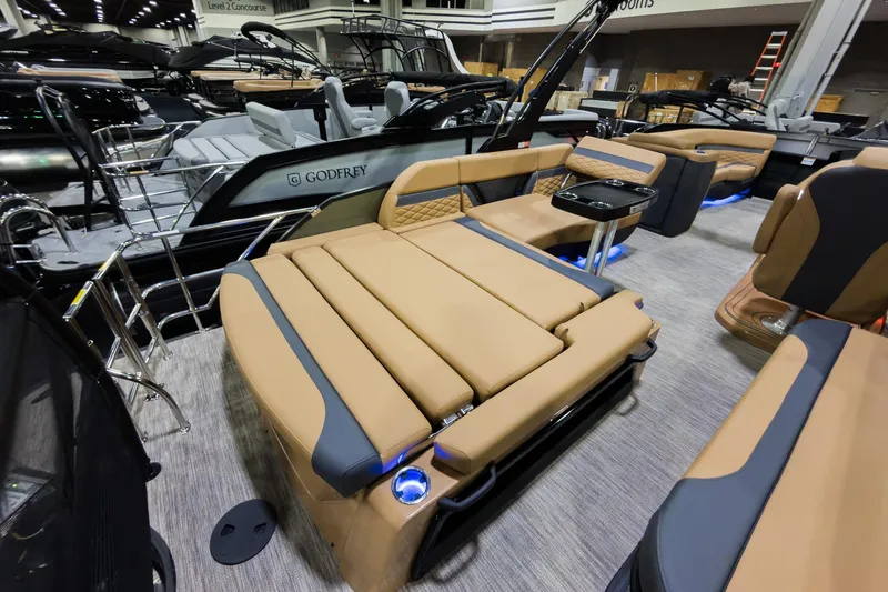 Slide: The Image of 2026 Godfrey Monaco 255 Single Flip Lounge boat with luxurious seating and modern design. - 25