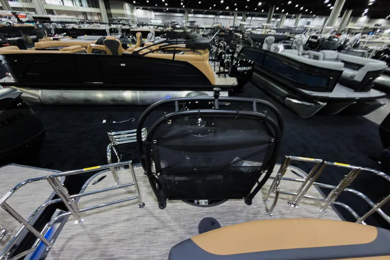 Slide: The Image of 2026 Godfrey Monaco 255 Single Flip Lounge boat at indoor exhibition. - 29