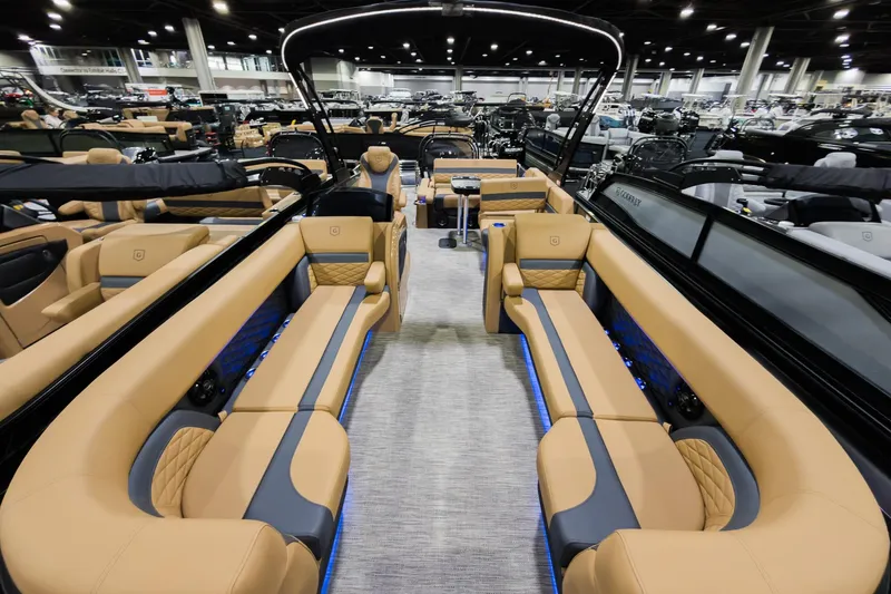 Slide: The Image of Luxurious interior of 2026 Godfrey Monaco 255 Single Flip Lounge boat at a showroom. - 5