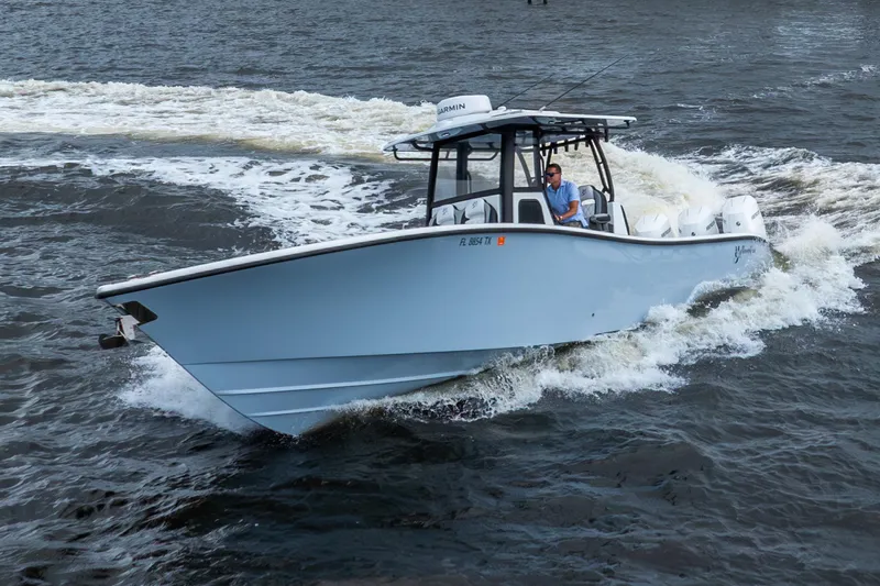 Slide: The Image of 2025 Yellowfin 36 Offshore boat cruising on open water. - 3