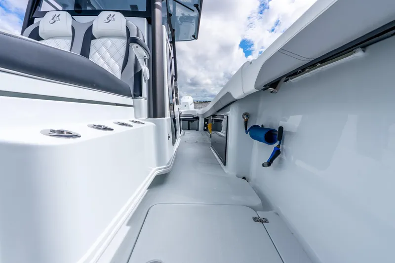 Slide: The Image of 2025 Yellowfin 36 Offshore boat interior with sleek seating and modern design. - 38