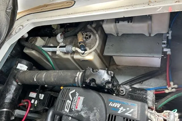 Slide: The Image of Engine compartment of a 2009 Meridian 391 Sedan boat, showcasing mechanical components. - 17