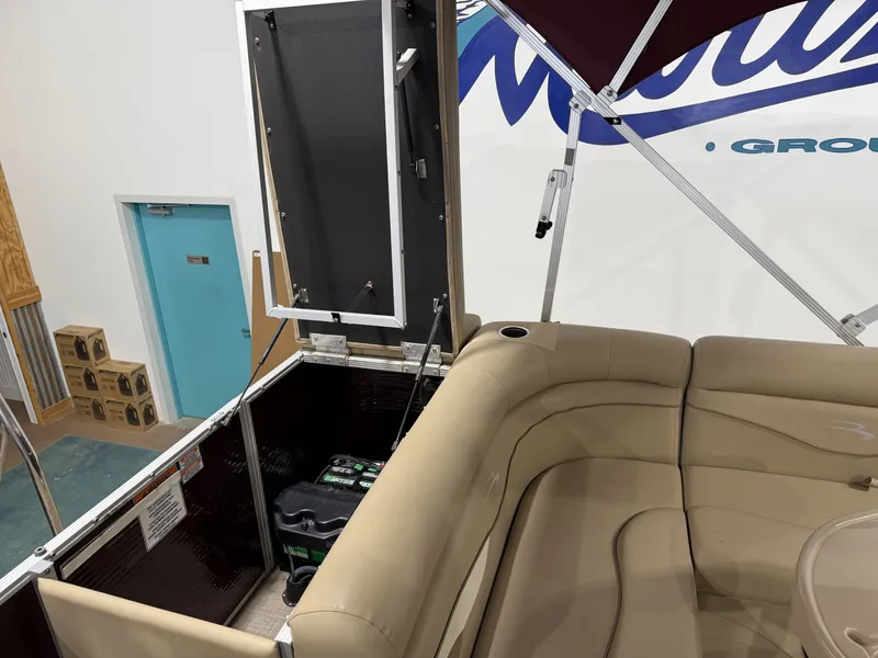 Slide: The Image of Interior view of a 2016 Bennington 20SLX pontoon boat with seating area. - 12