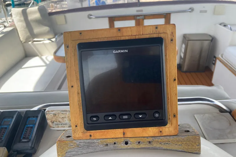 Slide: The Image of Garmin navigation system on 1986 Island Gypsy 40 Motor Yacht dashboard. - 17