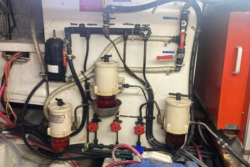 Slide: The Image of Engine room of 1986 Island Gypsy 40 Motor Yacht with fuel filtration system. - 51