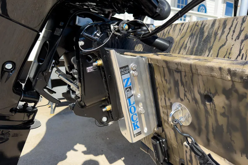 Slide: The Image of 2026 Excel Bay Pro Elite 220 boat with Z-Lock Pro Hi Jacker detail. - 26