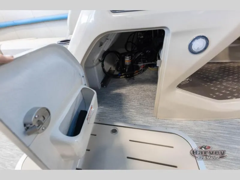 Slide: The Image of Open storage compartment in M Series 23 MFB boat, year 2026. - 15