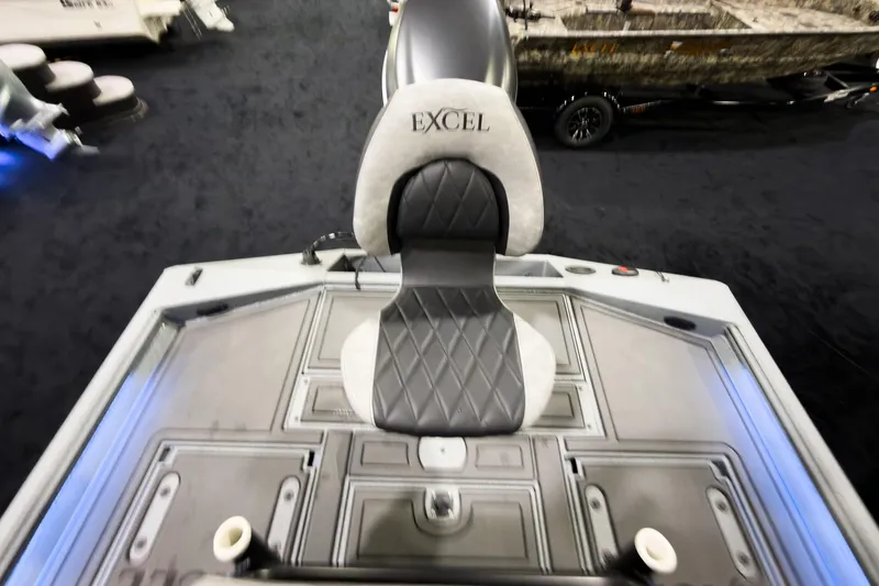 Slide: The Image of 2026 Excel 230 Bay Pro Elite boat seat with diamond-pattern upholstery. - 11