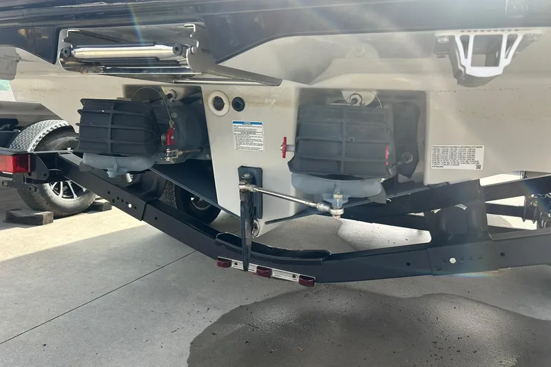 Slide: The Image of 2024 Yamaha Boats AR220 jet propulsion system on trailer, rear view. - 15