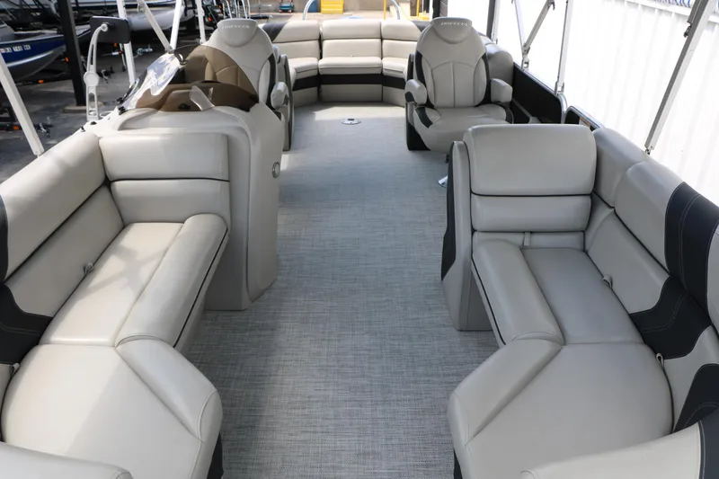 Slide: The Image of 2020 Trifecta 24RF LE pontoon boat interior with spacious seating and modern design. - 20