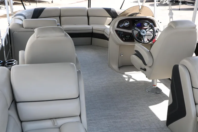 Slide: The Image of Luxurious interior of 2020 Trifecta 24RF LE pontoon boat with plush seating and modern helm. - 26