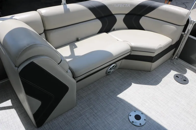 Slide: The Image of Luxurious seating on 2020 Trifecta 24RF LE pontoon boat, featuring beige and black upholstery. - 28