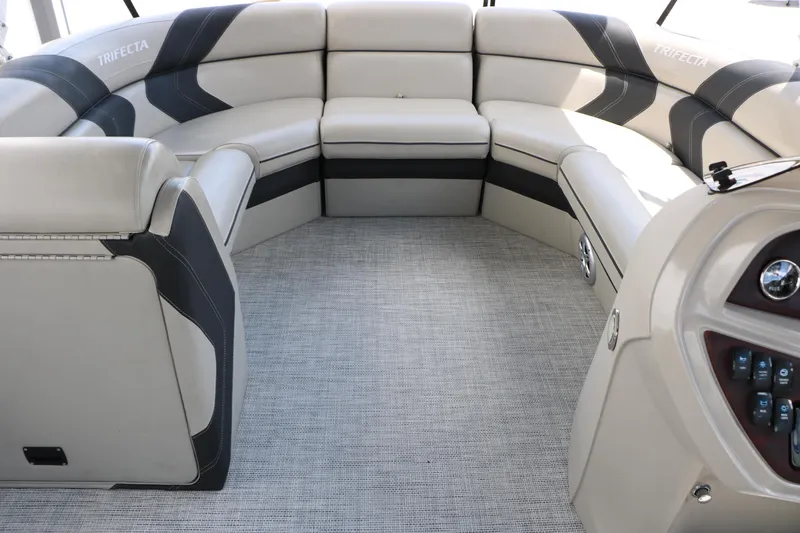 Slide: The Image of Luxurious interior of a 2020 Trifecta 24RF LE pontoon boat with plush seating. - 31