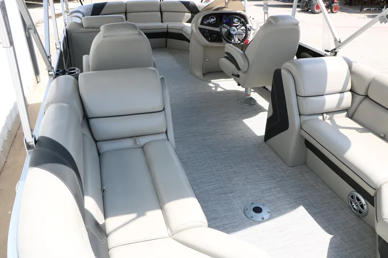 Slide: The Image of Luxurious interior of 2020 Trifecta 24RF LE pontoon boat with plush seating and modern helm. - 32