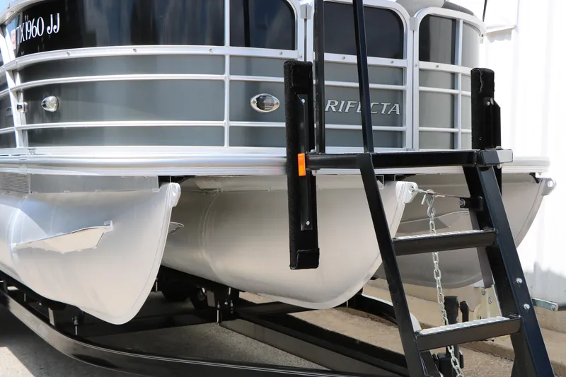 Slide: The Image of 2020 Trifecta 24RF LE pontoon boat with ladder and sleek design. - 4