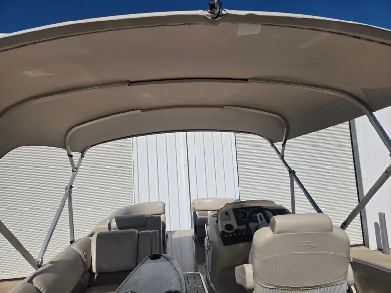 Slide: The Image of Interior view of a 2017 Bennington R23 pontoon boat with canopy. - 11