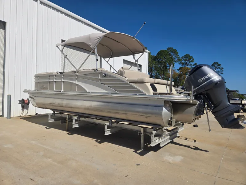Slide: The Image of 2017 Bennington R23 pontoon boat with Yamaha motor on trailer. - 2