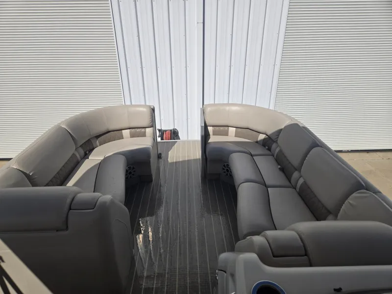 Slide: The Image of Interior of a 2017 Bennington R23 pontoon boat with gray leather seating. - 8