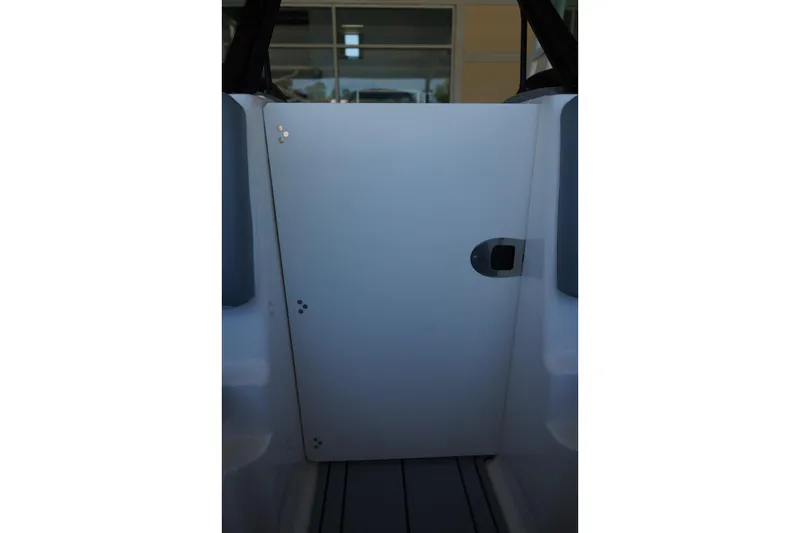Slide: The Image of 2026 Chaparral 21 SSi OB boat interior door detail. - 10
