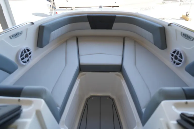 Slide: The Image of Interior view of 2026 Chaparral 21 SSi OB boat, featuring spacious seating and modern design. - 3