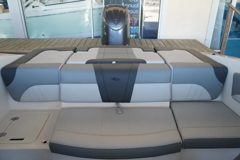 Slide: The Image of 2026 Chaparral 21 SSi OB boat interior with gray and white seating. - 6
