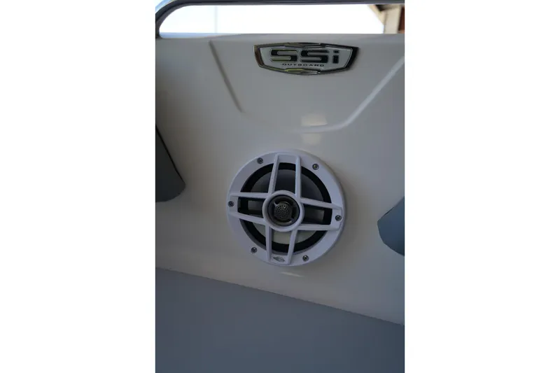 Slide: The Image of 2026 Chaparral 21 SSi OB boat speaker and logo detail. - 7